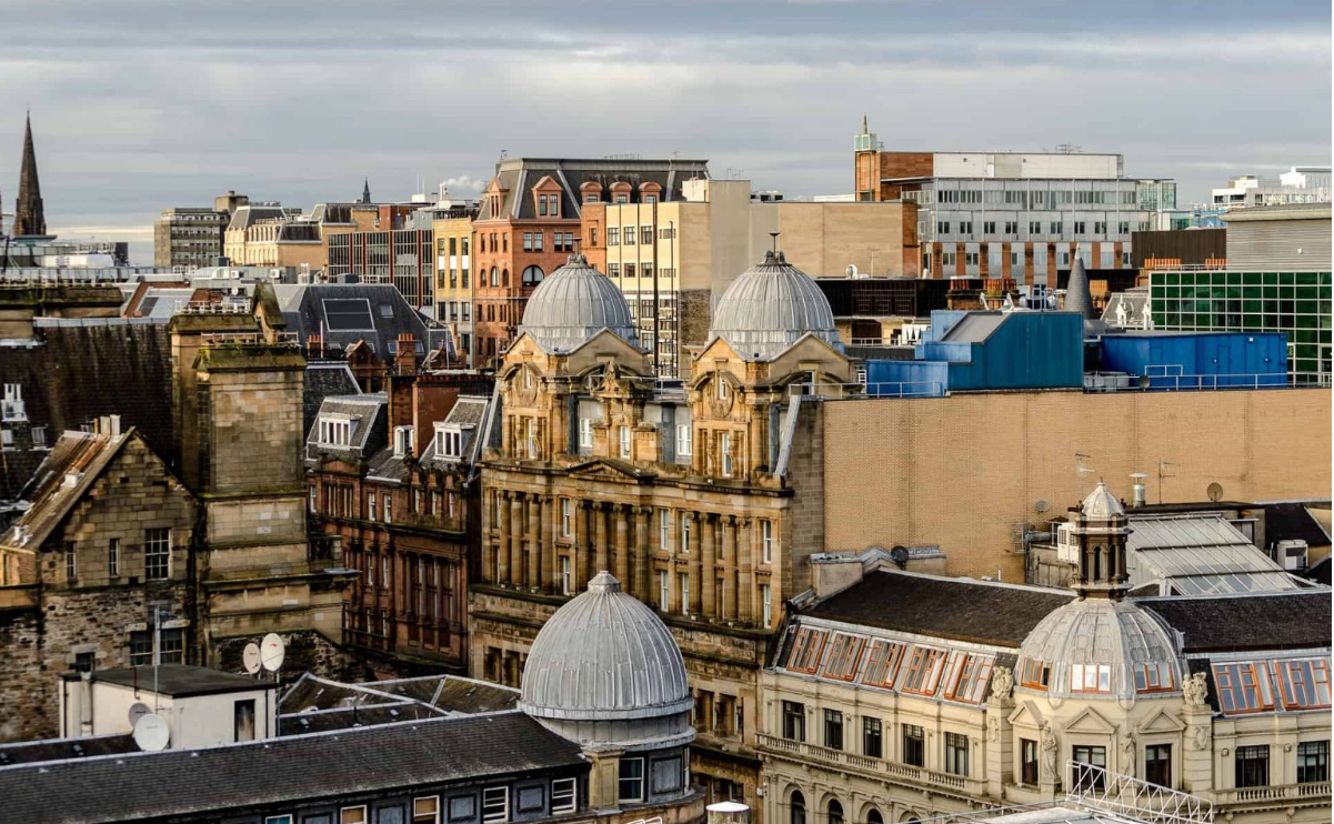 Glasgow city centre skyline with historic domes and sandstone buildings